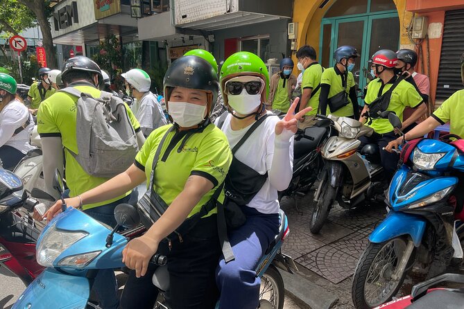 Saigon Afternoon Unseen Street Food by Scooter |Opt: Ao Dai Rider - A four-hour ride through Saigon beyond the usual sights