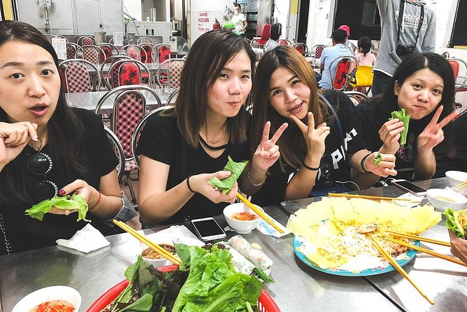 Saigon Afternoon Unseen Street Food by Scooter |Opt: Ao Dai Rider - Banh xeo and wild vegetables at a local restaurant