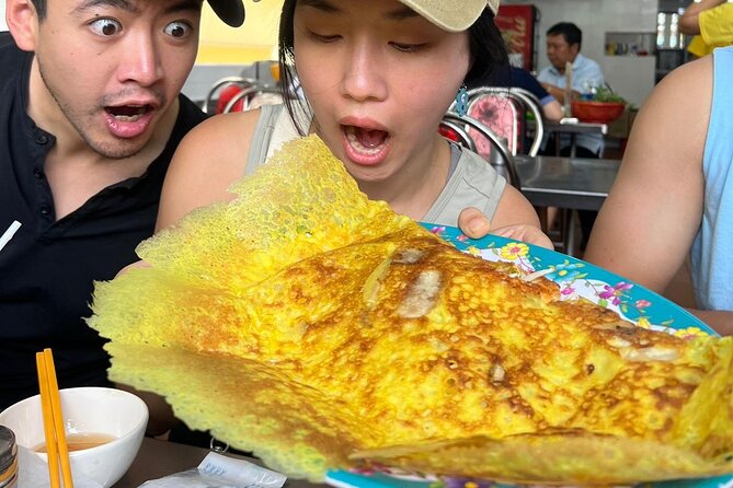 Saigon Food Tour by Scooter with Eleven Tastings - Making bánh xèo in District 10