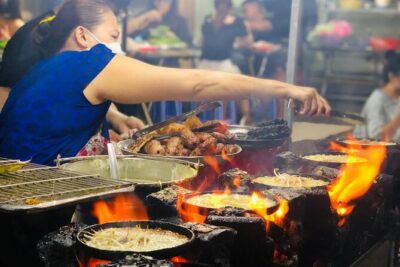 Saigon Food Tour by Scooter with Eleven Tastings