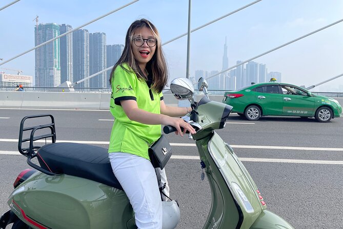 Saigon Morning And Afternoon Adventure Street Food Tour by Vespa - District 5, the flower market, and Thien Hau Temple