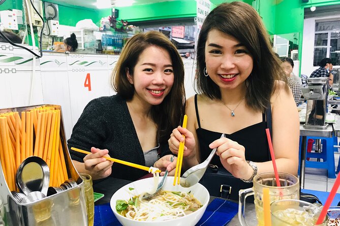 Saigon Night Scooter Experience And Local Food - Old apartments and working-class Saigon