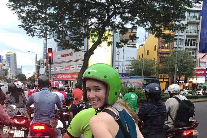 Saigon Night Scooter Experience And Local Food - Fashion streets, bridges, and the move to District 7