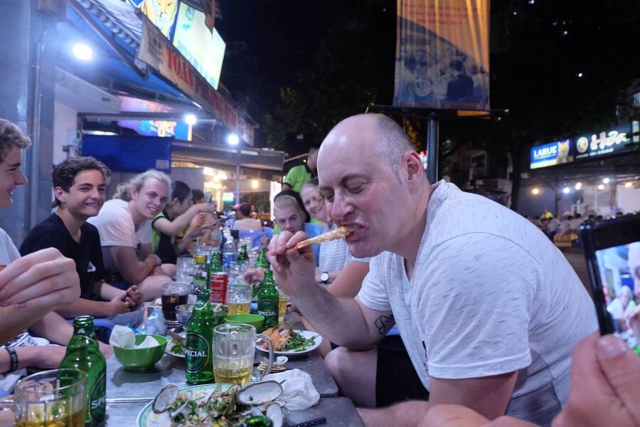 Saigon: Night Sightseeing And Street Food Tour By Vespa - Grilled rice paper at the flower market