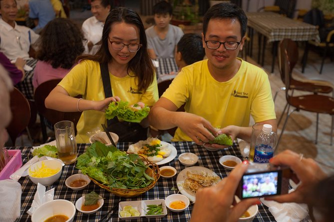 Saigon Night Street Food and City Tour on Scooter - Street barbecue with a mini grill