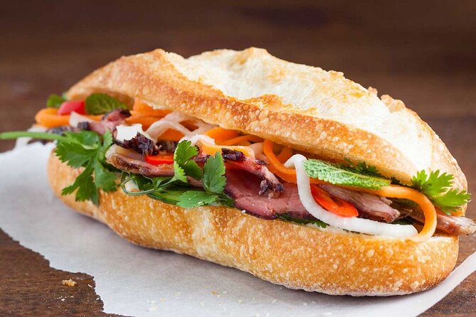 Saigon Secrets - Half Day Tour With Vintage Vespa - Bánh mì and the first American Embassy