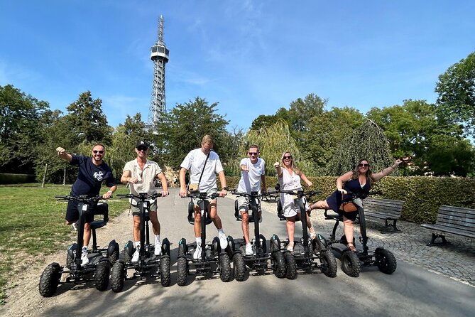 Scooter tours to Prague Castle and views. - A quiet pause beside the Vltava