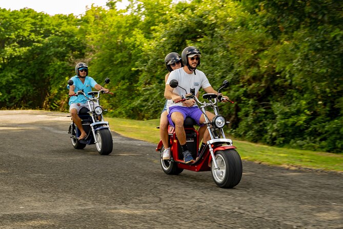 St.Lucia Beaches and Backroads Tour by Electric Big-Wheel Scooter - Reduit Beach starts the ride