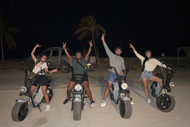 Sunset Island Tour in Aruba on Electric Scooter (1 or 2-seater) - Palm Beach shows Aruba’s evening energy