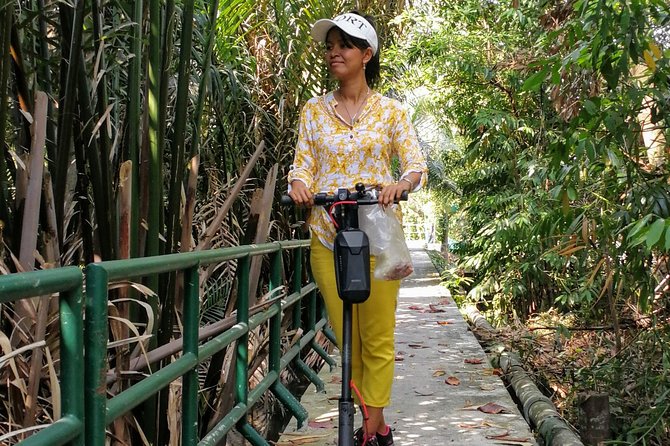 Take a E-Scooter Ride in Bangkok's Jungle - Meeting at Wat Khlong Toei Nok Pier