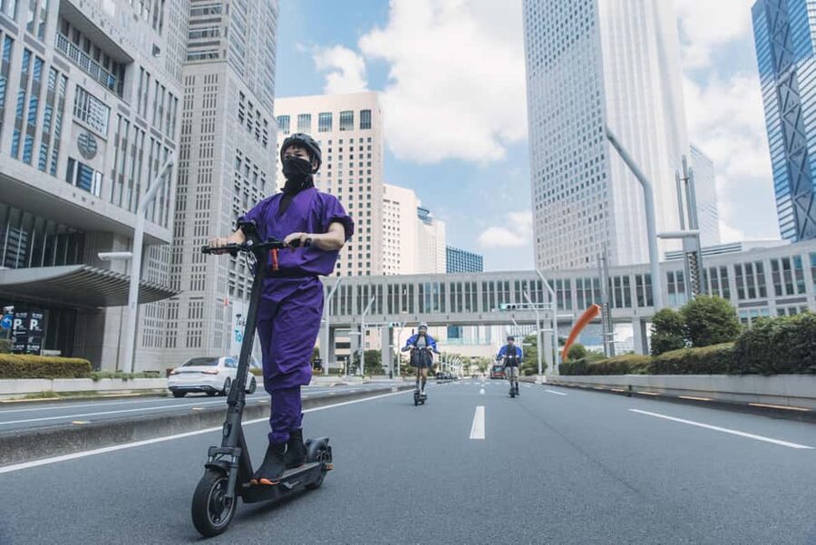 Tokyo: Ninja E-Scooter Tour with English Speaking Guide - Starting beneath the Godzilla Head