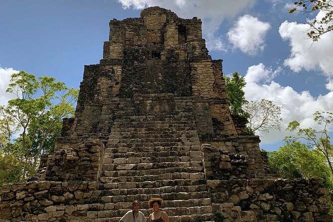 Tulum Guided ATV/Scooter, Muyil Ruins, Boat Eco, Float Down Mayan Canals + Lunch - Walking through Muyil’s ancient ruins