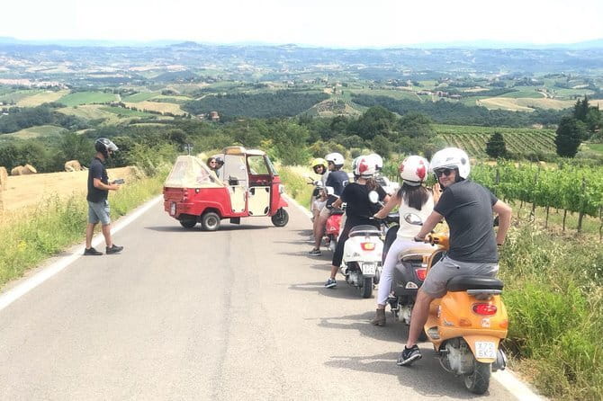 Tuscany Vespa Tour from Florence with Wine Tasting - Riding through the countryside near San Gimignano