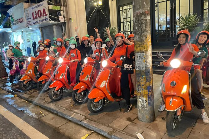 Vespa Female Ao Dai riders Night Street Food + See Train Street - What the $68 price covers