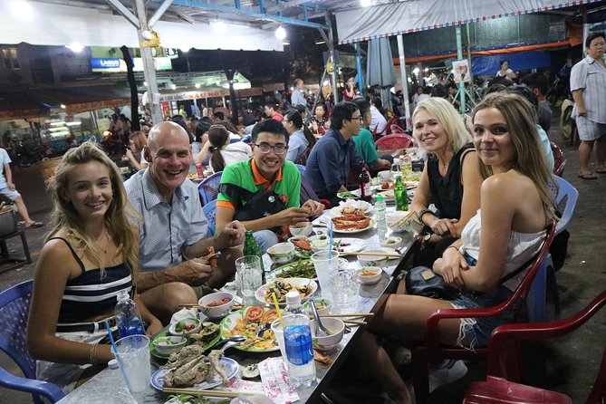 Vespa Saigon By Night Street Food Tour - Seafood with a different side of Saigon