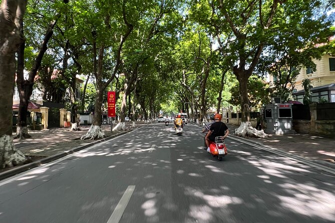 Vespa Tour HANOI BACK STREETS: FOOD+LOCAL LIFE+CULTURE & FUN - West Lake, the mosaic wall, and Huu Tiep Lake